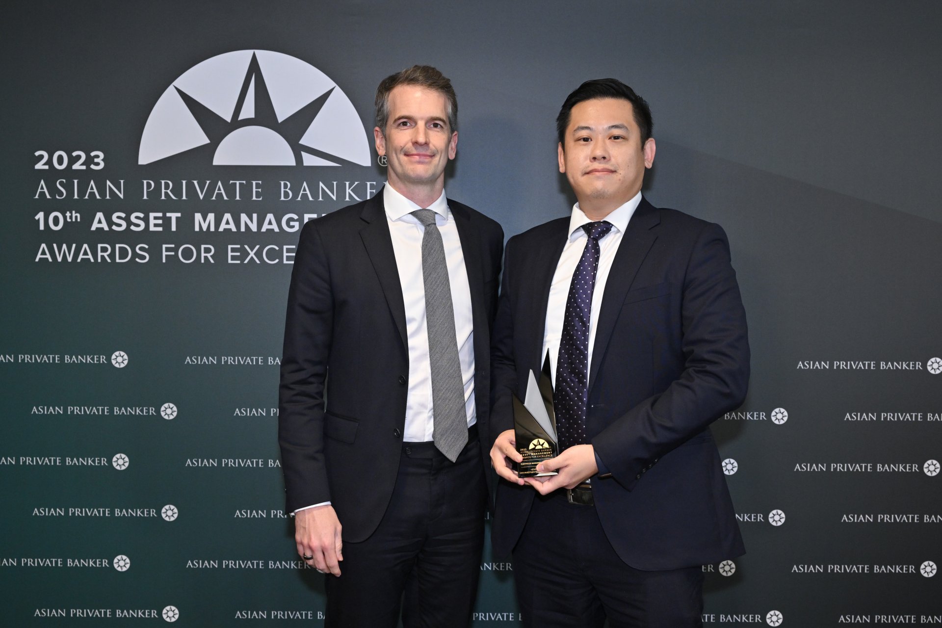 Accepting Portfolio Manager of the Year on behalf of Henry Wong at Asian Private Banker’s 10th Asset Management Awards for Excellence is Robert Gibbs and Osvaldo Kwan