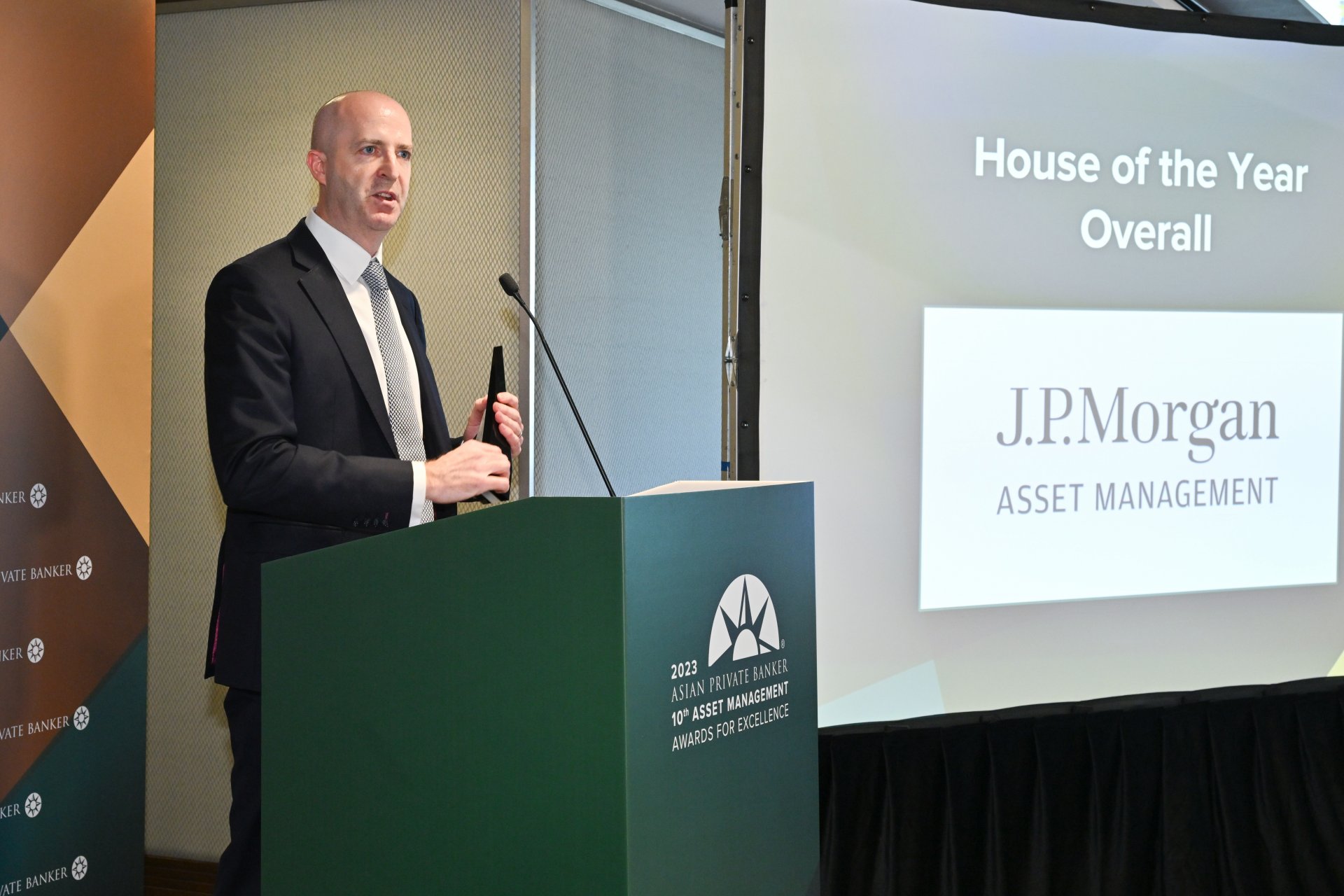 Dan Watkins, Chief Executive Officer, Asia Pacific of J.P. Morgan Asset Management accepts the award for House of the Year - Overall