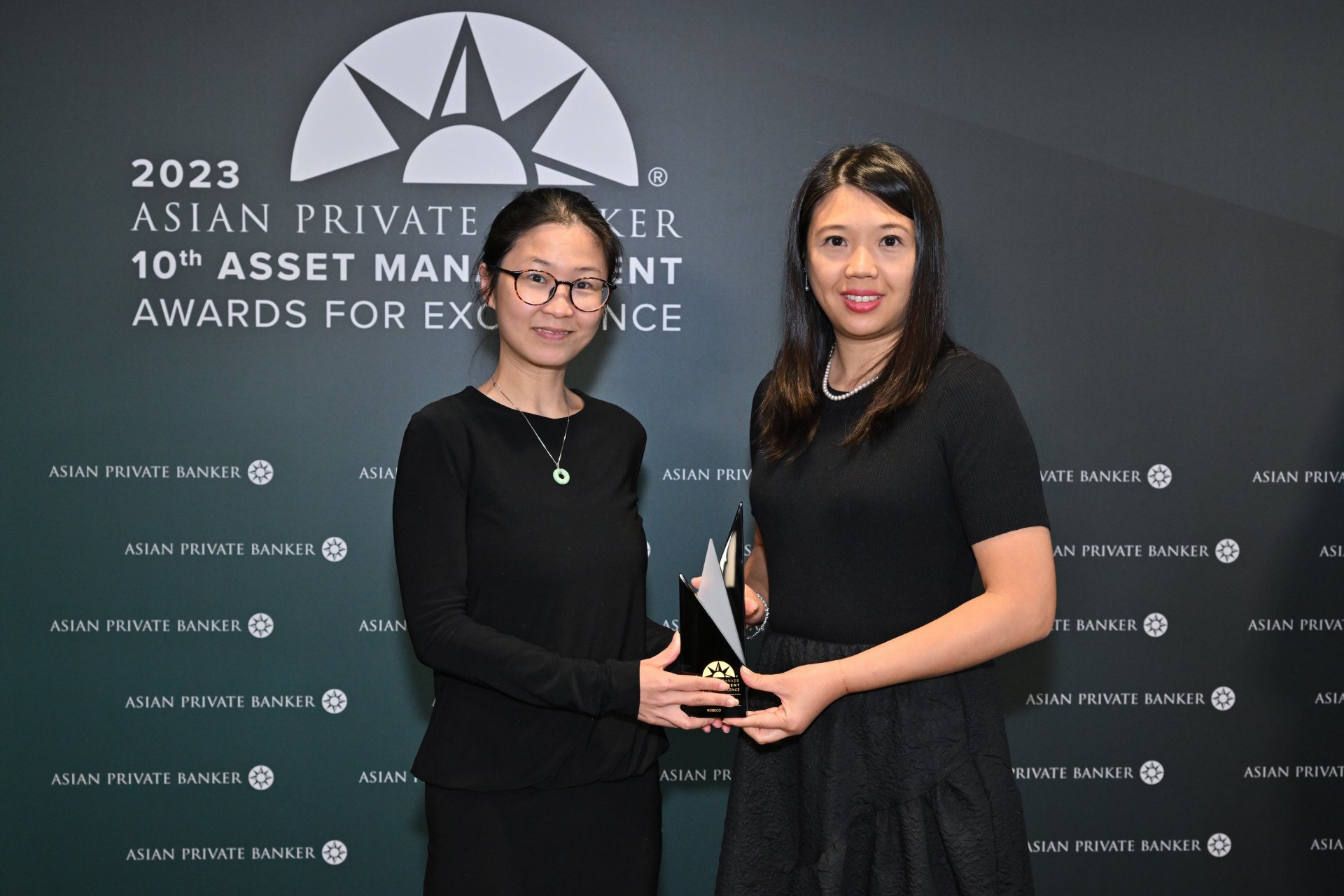 Kerry Chan and Corinne Yuen of Robeco accept their win for Best Fund Provider - Value Equity