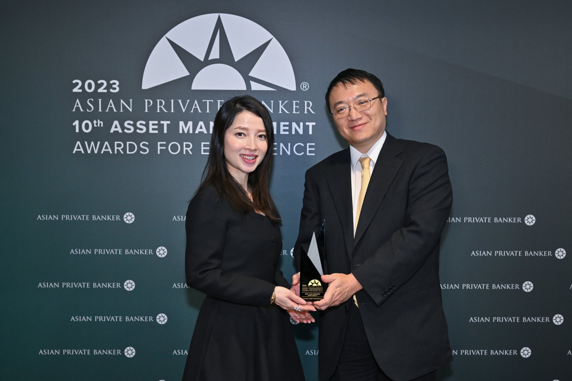 Vicky Yick and John Liu accept Nomura Asset Management's win for Best Fund Provider - Japan Equity