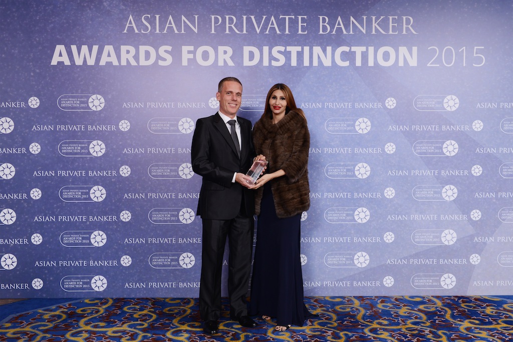 Christian Senn from Credit Suisse receives the award for Best Private Bank - Thailand International