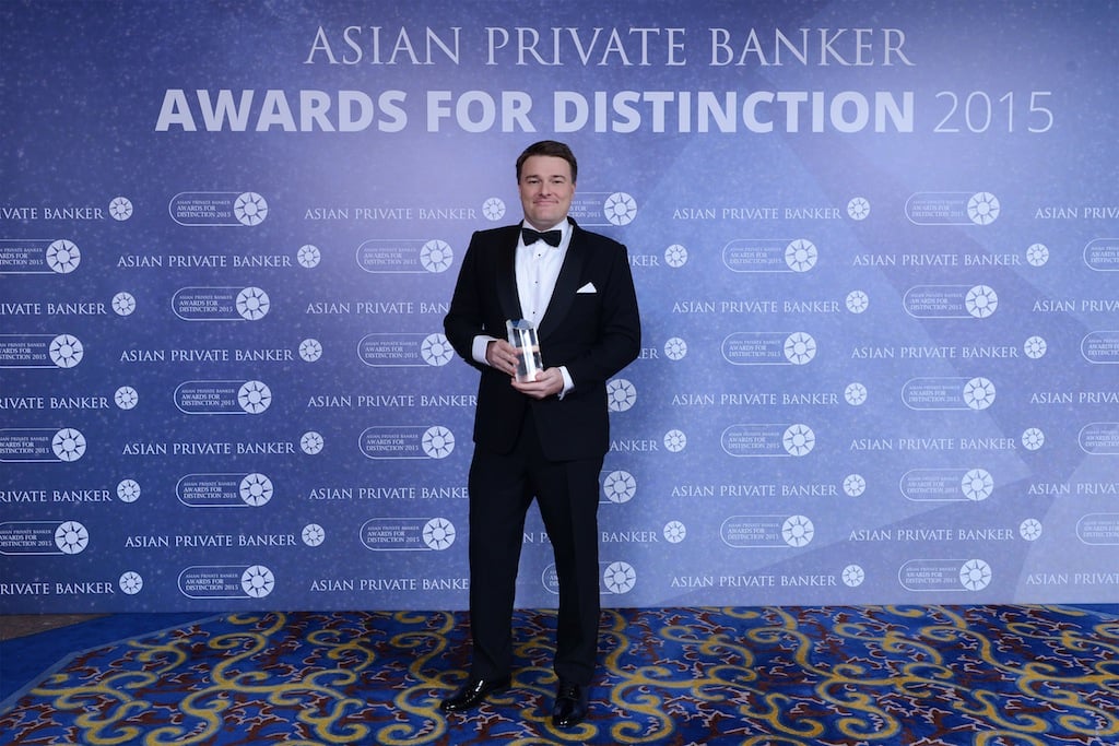 Marcus Sloor from Credit Suisse receives the award for Best Private Bank - Malaysia International
