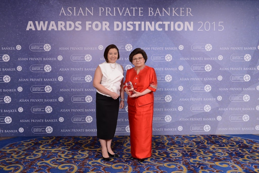 Stella Cabalatungan and Josephina Tan from BDO Private Bank receives the award for Best Private Bank - Philippines Domestic