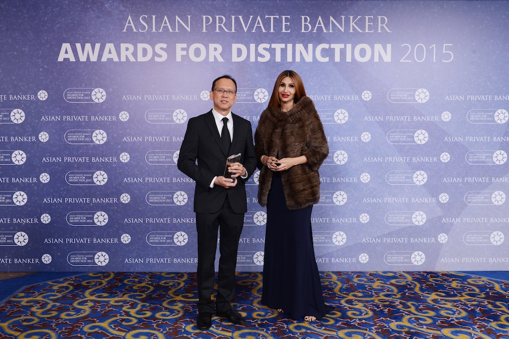 Theerapan Nunthapolpat from Siam Commercial Bank receives the award for Best Private Bank - Thailand Domestic