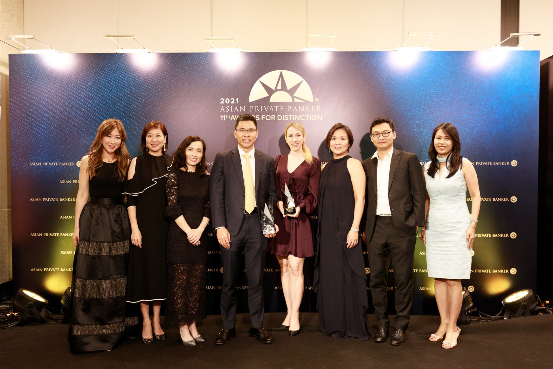 Representatives from UBS Global Wealth Management celebrating their two wins at the 11th Awards for Distinction