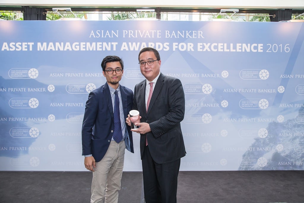 Terence Lam from AXA Investment Management receives the award for Best Fund Provider - Real Estate Asset